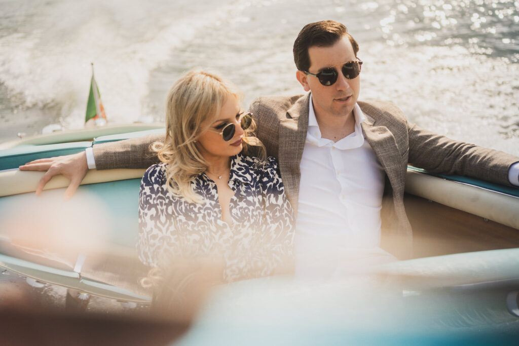 couple on the boat tin lake como