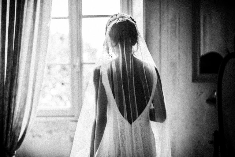 bride looking out the window in Lake Como shot by film